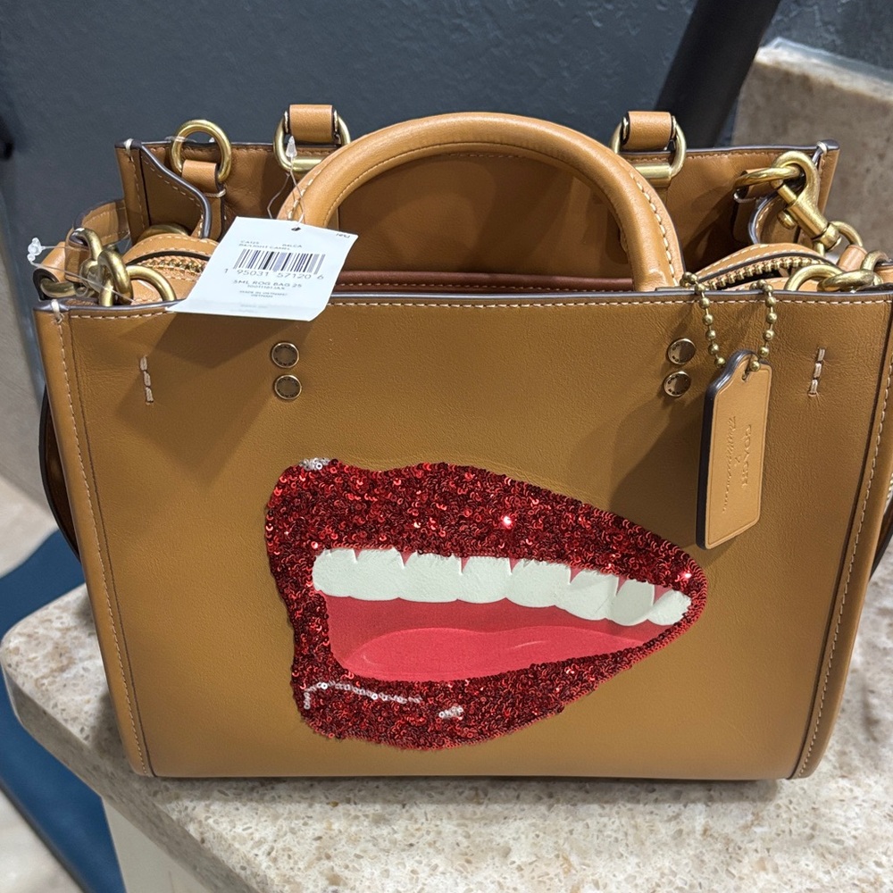 Coach Brown Satchel with Red Glitter Lip Design